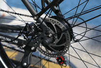 OneSport OT12 gears and chain in black by the sea