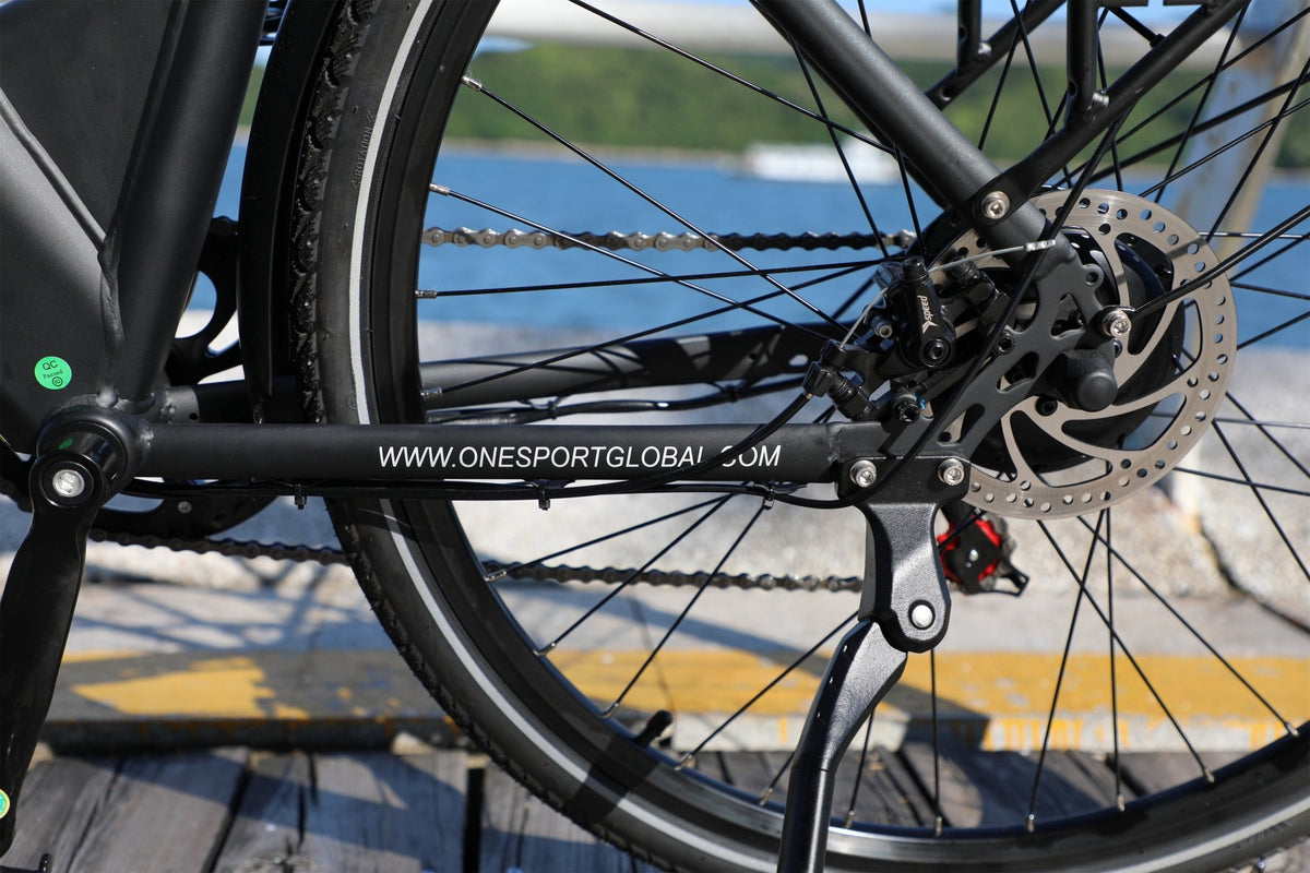 OneSport OT12 cranks and pedals in black by the sea