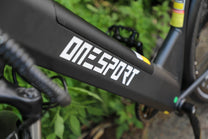 OneSport OT12 logo detail in black in a park