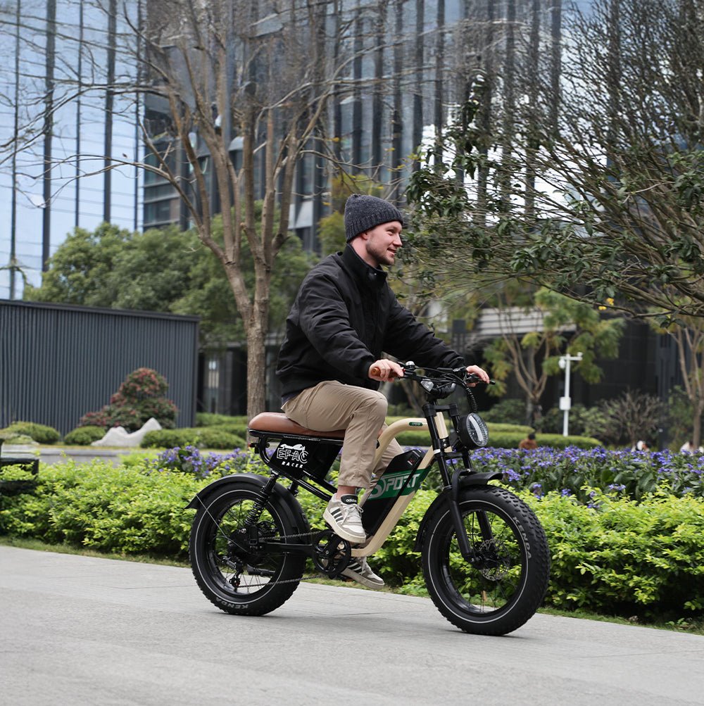 Man riding the OneSport W66 fat-tyre e-bike in the city