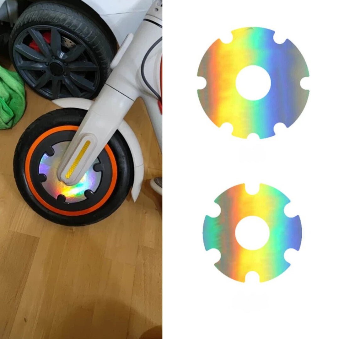 Close-up of reflective safety sticker for wheel cover in holographic finish on the electric scooter
