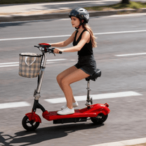 Woman riding the SEEDREAM M5 electric scooter