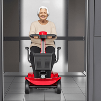 Older woman sitting in the SEEDREAM X-02 mobility scooter indoors