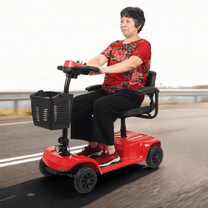 Woman sitting on the SEEDREAM X-02B Lucas mobility scooter
