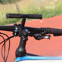 Close-up of smart child seat Pro on the bicycle handlebar