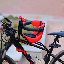 Smart child seat for bike frames in red on a bicycle, side view