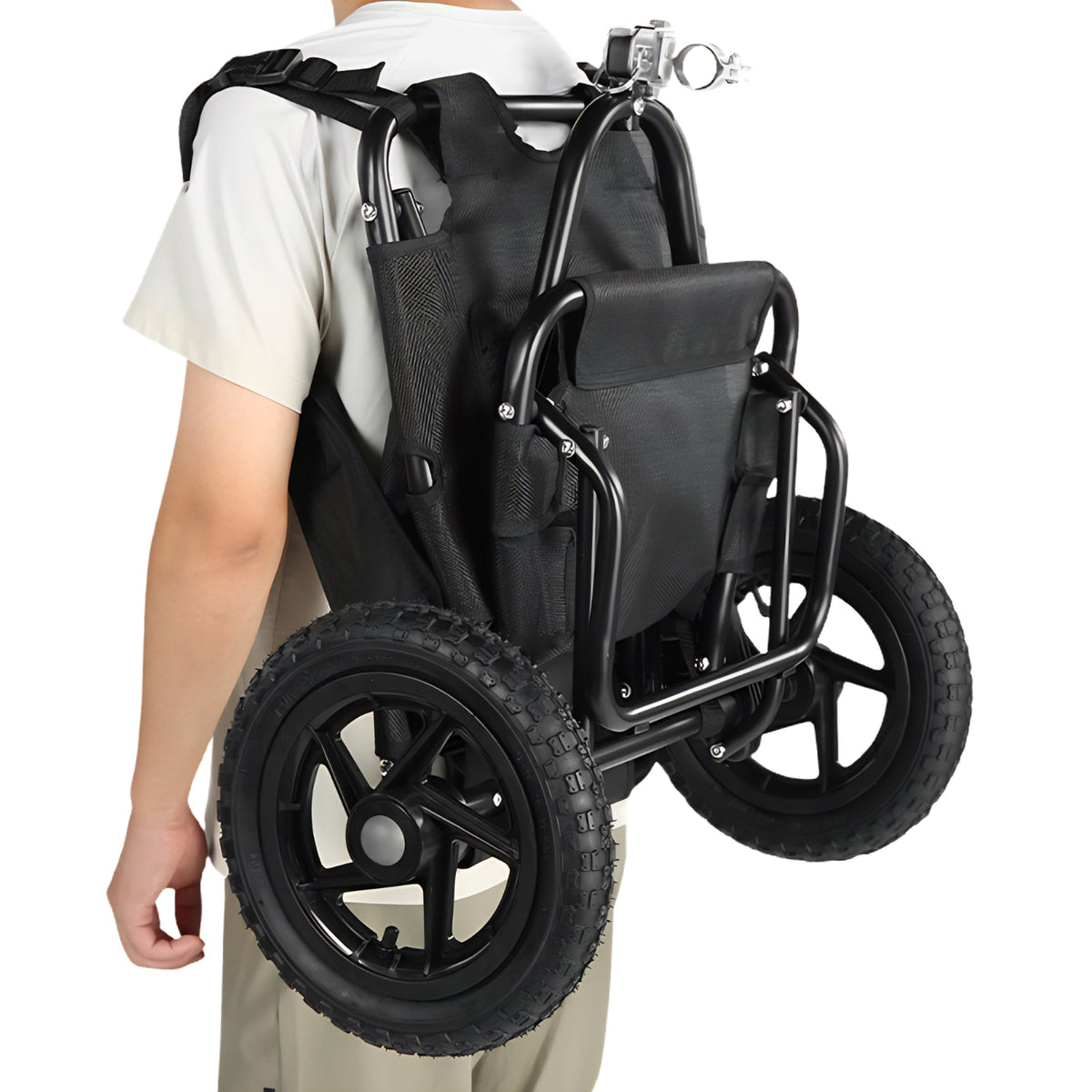 Person carrying the Smart cargo bike trailer as a backpack