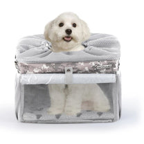 Smart front pet basket in camouflage with a dog inside