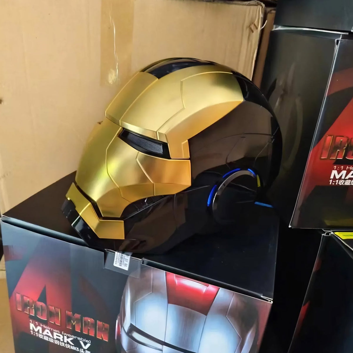 Smart helmet Iron Man Edition in gold on its box