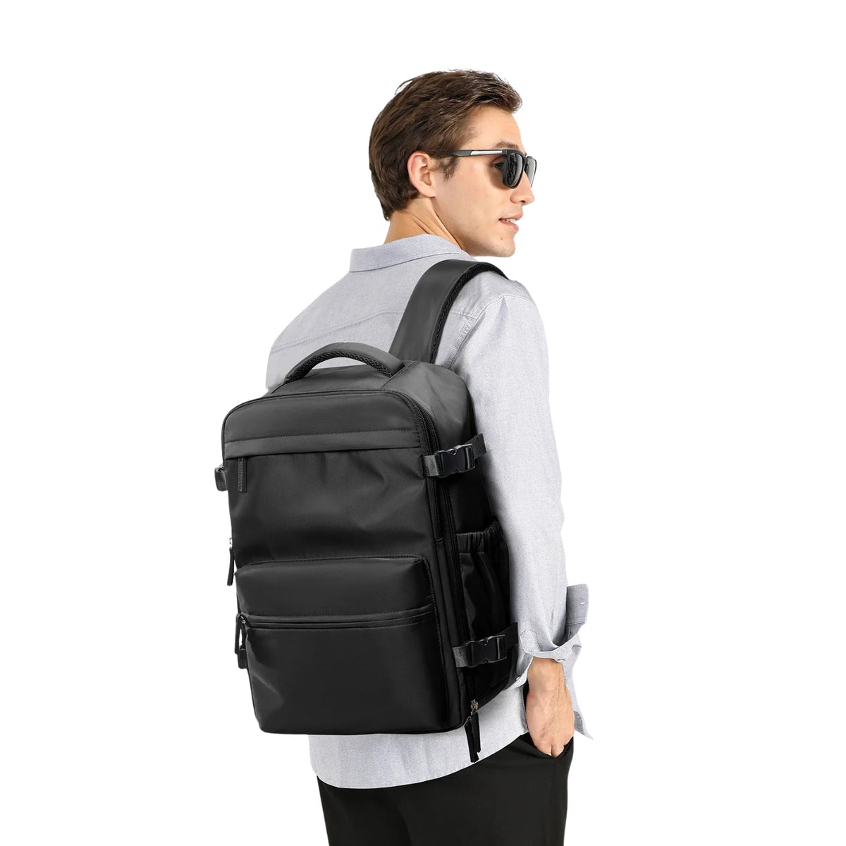 Smart backpack Vacuum Edition in black, worn by a person, side view