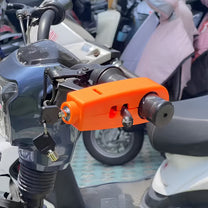 Smart handlebar lock Plus in orange mounted on handlebars