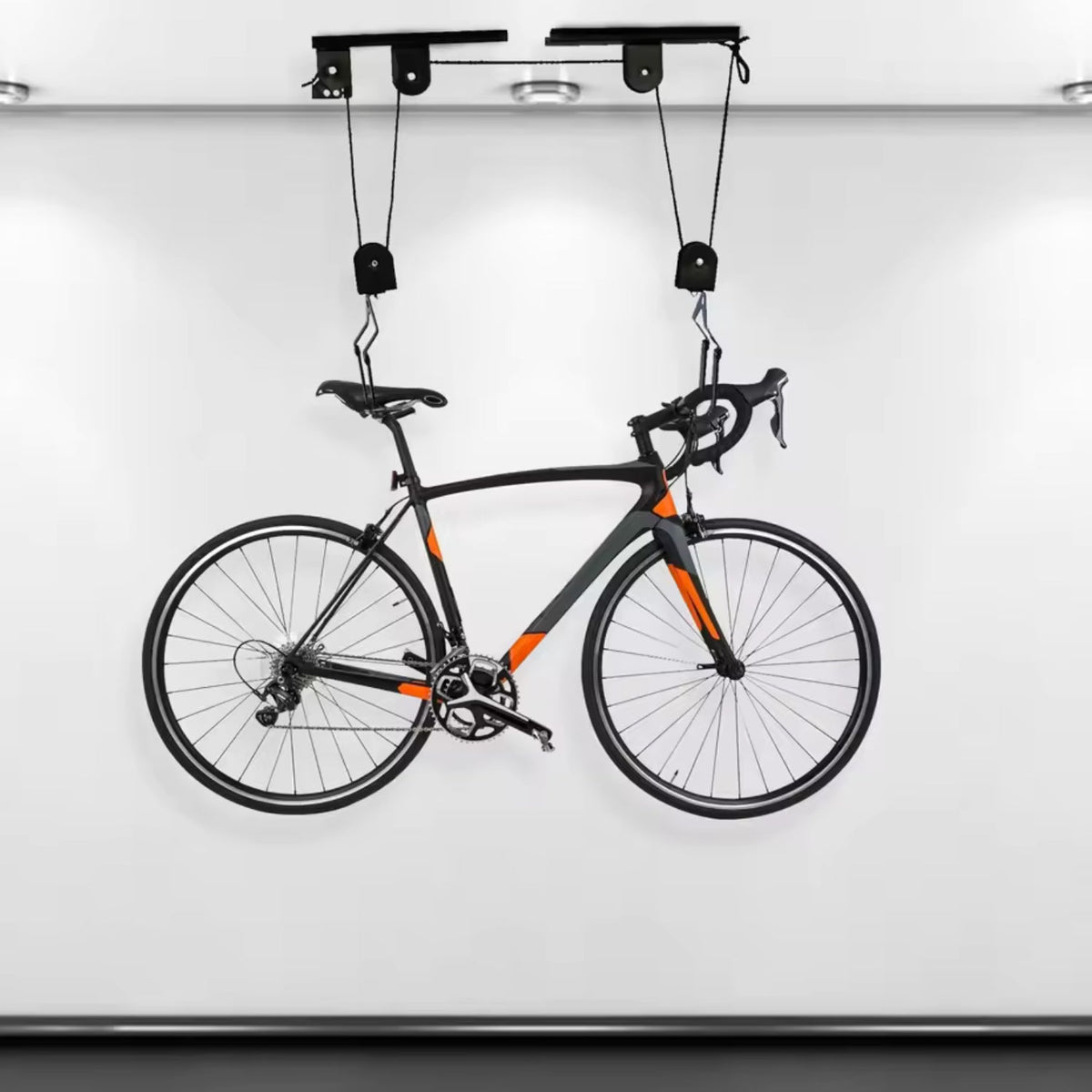 Smart bike ceiling mount with a bike on the ceiling, front view