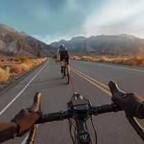 Smart retractable bike tow rope with hook towing a bicycle, from the rider’s point of view