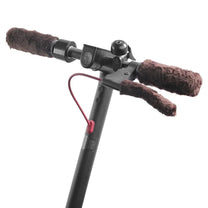 Smart warm-lined handlebar covers in brown on the electric scooter, front view