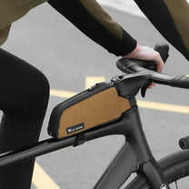 Smart top tube bag for e-bikes while riding