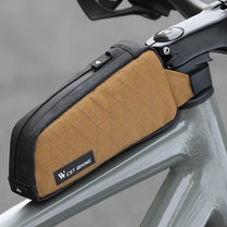 Smart top tube bag for e-bikes in brown on a bicycle, side view