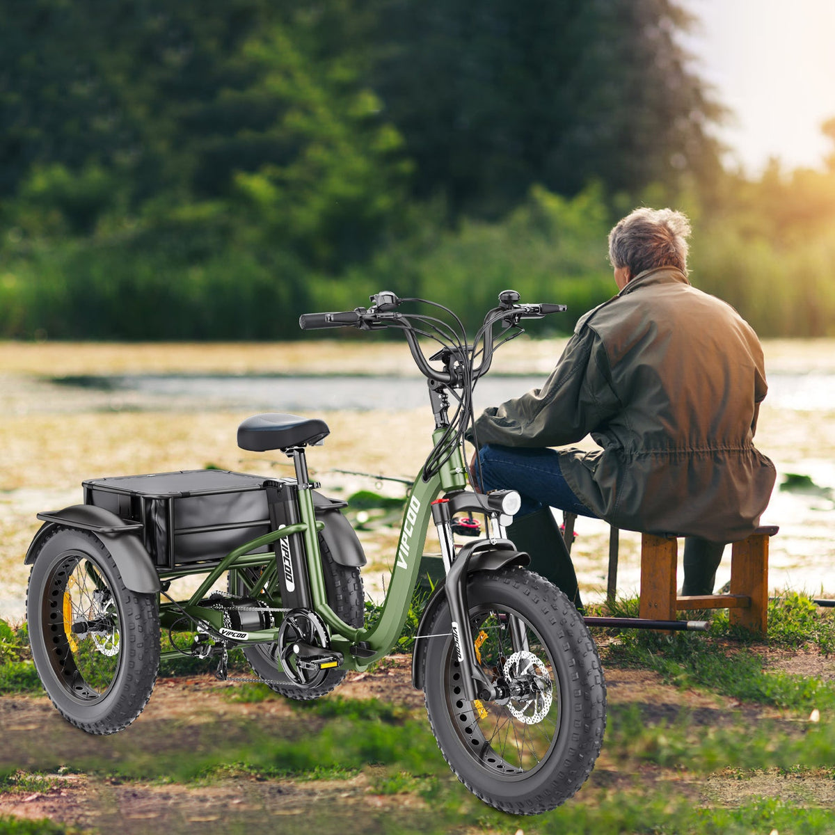 Man riding the Hidoes ET1 electric tricycle by a lake