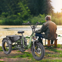 Man riding the Hidoes ET1 electric tricycle by a lake