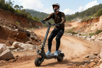 Man riding the VIPCOO VS9 electric scooter on a trail