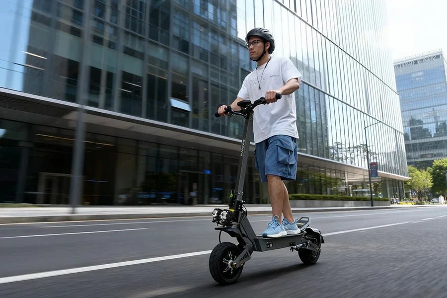Man riding the VIPCOO VS9 electric scooter in the city