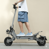 Person standing with the VIPCOO VS9 electric scooter