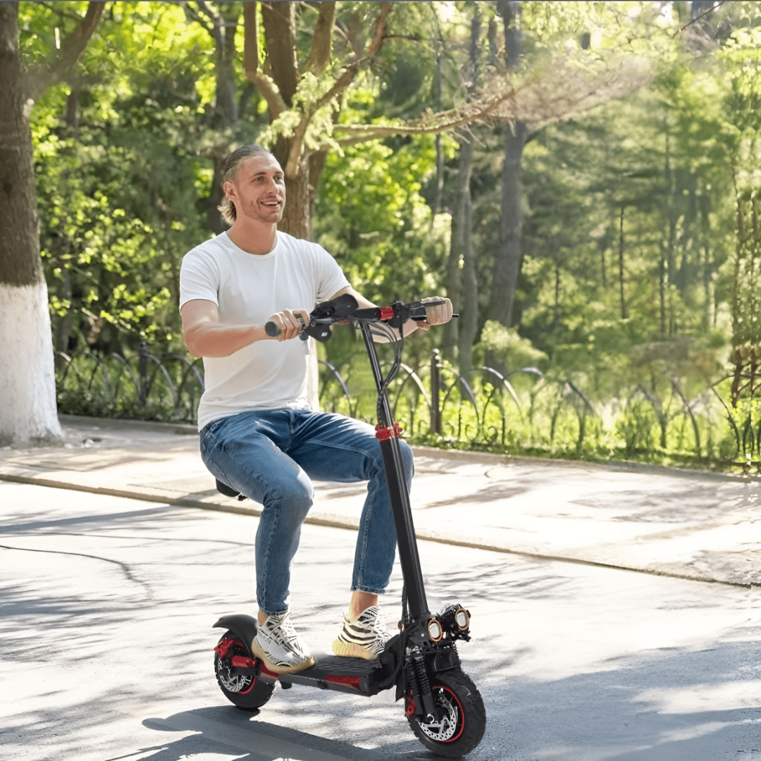 Man sitting on the Wheely J11 Max electric scooter