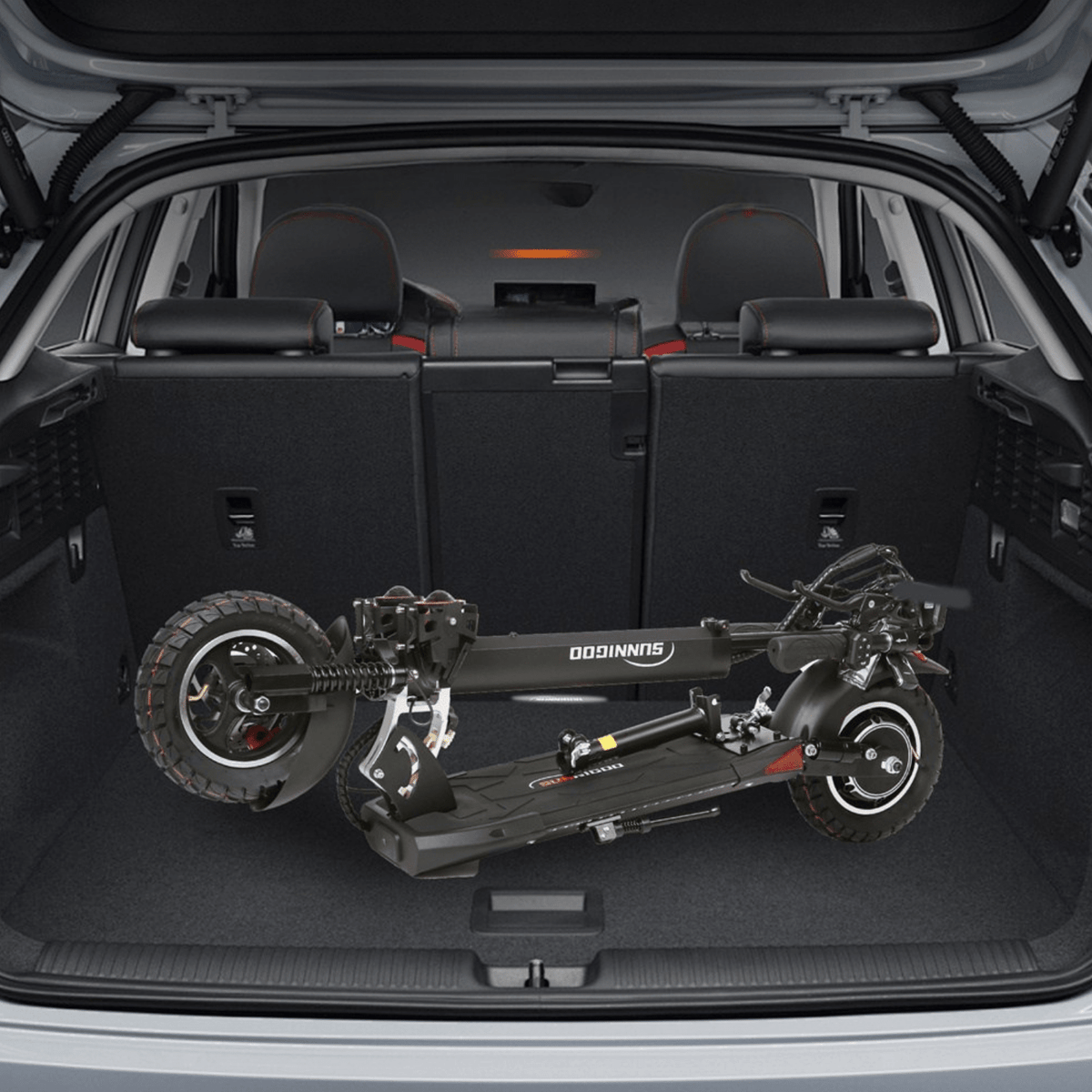 Folded Wheely N3L Max electric scooter in a car boot