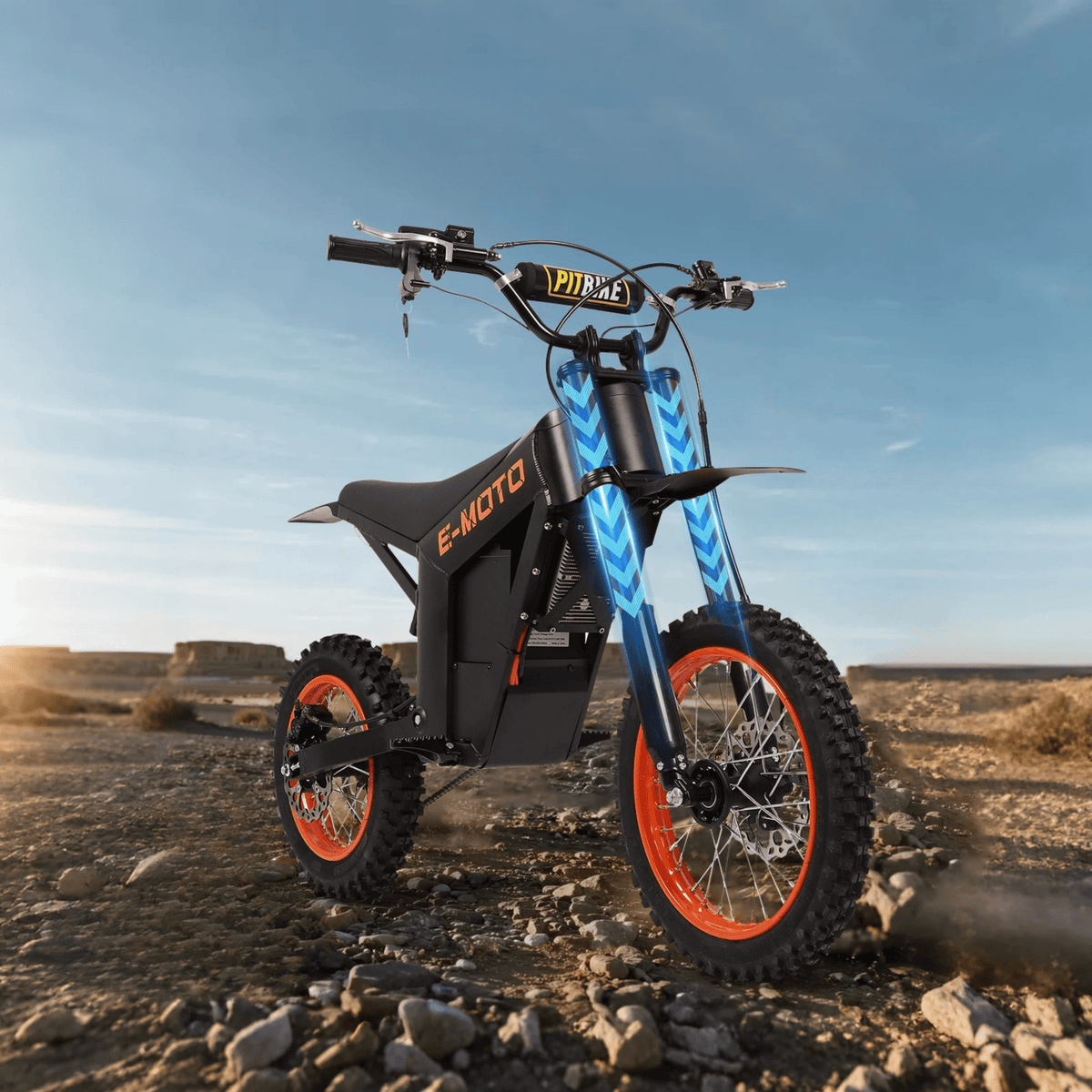 Wheely Y01 electric dirt bike, front three-quarter view on sandy ground