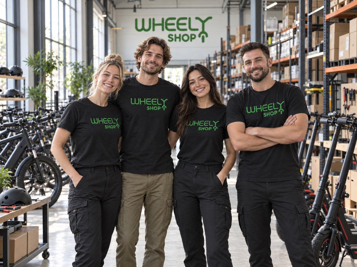 Wheelyshop’s story – from idea to innovation: the Wheelyshop team in the warehouse among e-bikes, electric scooters and spare parts