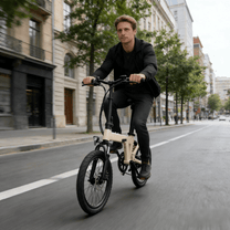 Man riding the YANGOR H19 folding e-bike in beige on a street