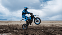 Rider taking the ZAWES S3 electric dirt bike off-road