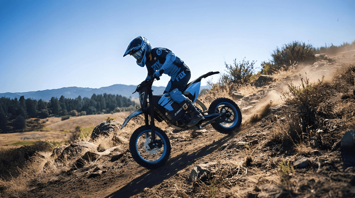 Rider taking the ZAWES S3 electric dirt bike off-road in the mountains